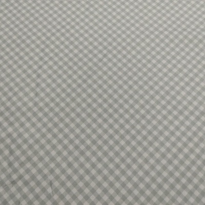 tecido xadrez cinza e branco com padrão de pequenos quadrados