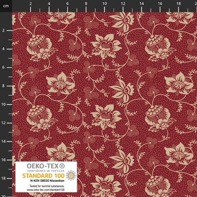 Tecido vermelho com padrão floral bege e etiqueta OEKO-TEX