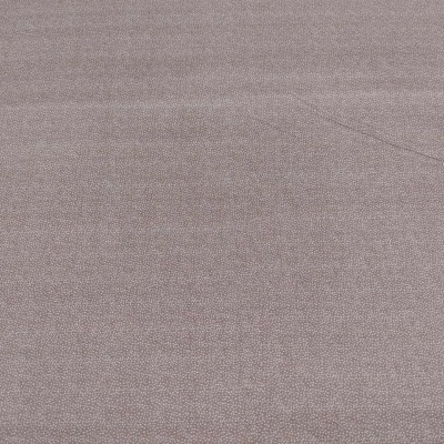 Tecido bege liso com textura suave e brilho ligeiro