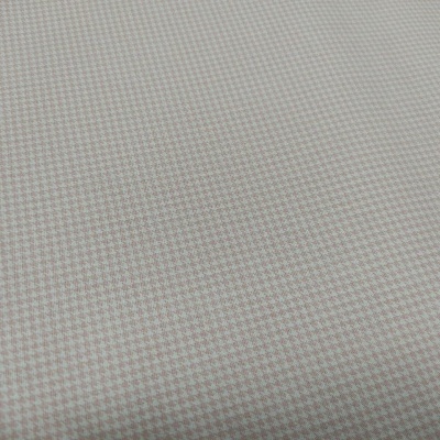 Tecido rosa claro e branco com padrão pequeno