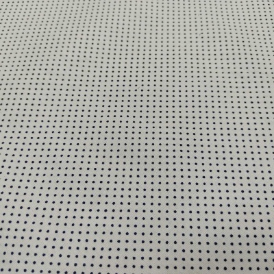 Tecido branco com pontos pretos pequenos e uniformes