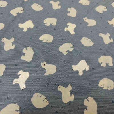 tecido azul com ursos polares brancos desenhados