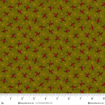 Tecido verde-oliva com padrão de raminhos vermelhos e verdes, régua para escala