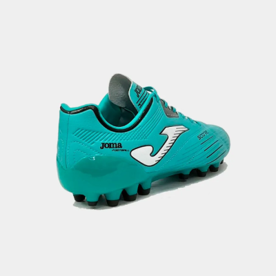 Chuteira de futebol azul turquesa Joma com sola preta e logotipo branco