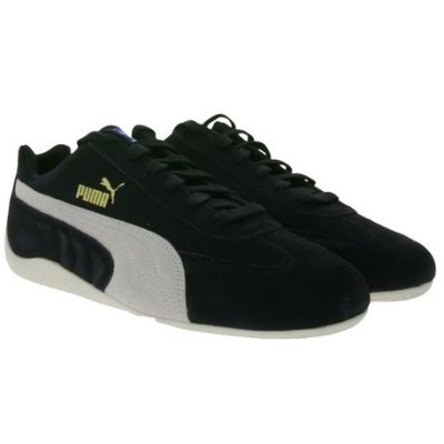 Ténis Puma pretos com risca branca e logótipo amarelo