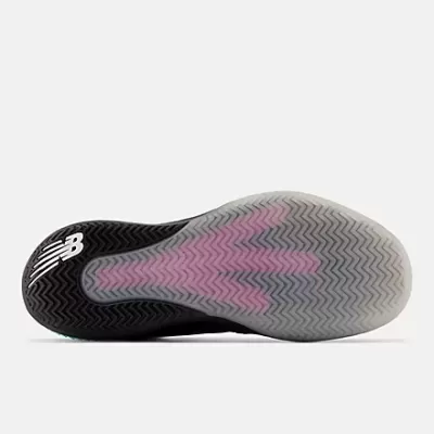 Sola de ténis preta com padrão ziguezague e logótipo branco da New Balance