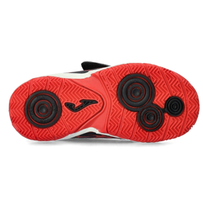 Sola de sapato desportivo vermelha e preta com padrão circular e logo Joma