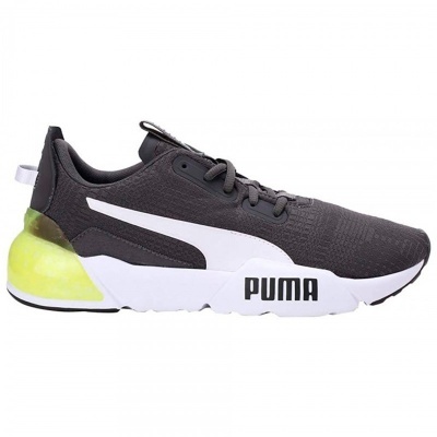 Ténis desportivo preto com detalhes brancos e amarelo translúcido, com marca PUMA na sola