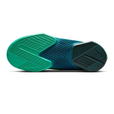 Sola de sapato desportivo verde e azul escuro com padrão antiderrapante