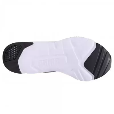 Sola de sapato branca e preta com logo Puma em relevo