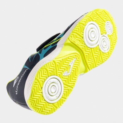 Sapatilha desportiva com sola amarela e preta vista de baixo