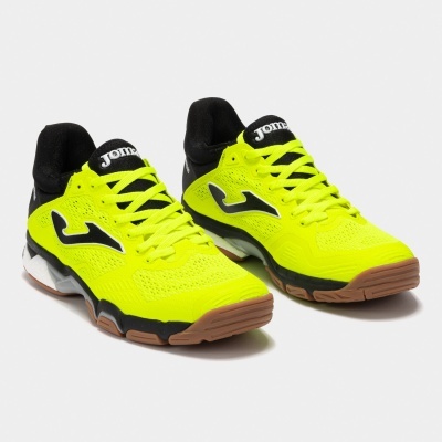 Sapatilhas desportivas amarelo neon com detalhes pretos e solas castanhas