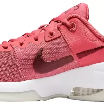 Ténis desportivo rosa com sola branca e logo Nike vermelho