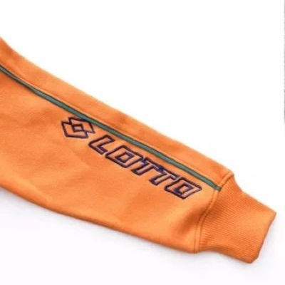 Manga de peça de roupa laranja com logótipo LOTTO