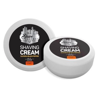 Creme de barbear The Shave Factory em embalagem branca com rótulo preto e texto branco e laranja