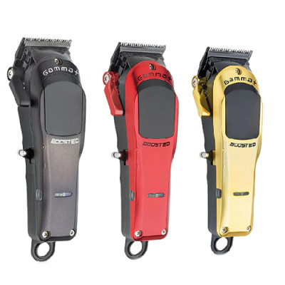 Três máquinas de cortar cabelo Gammax Boosted em preto, vermelho e dourado