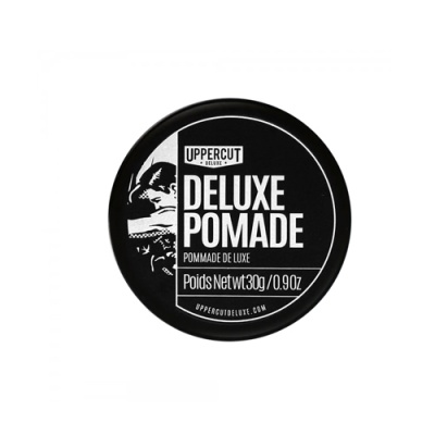 Embalagem redonda preta de pomada para cabelo Uppercut Deluxe Pomade com texto e ilustração