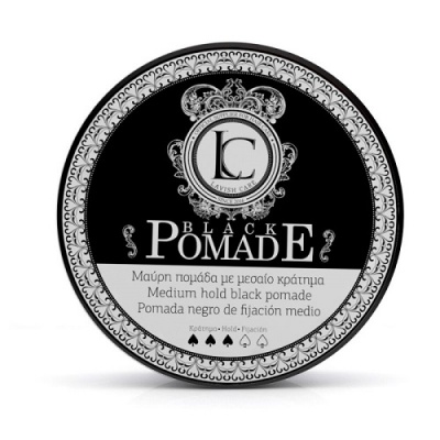 Embalagem redonda preta e branca de pomada BLACK POMADE com texto trilingue