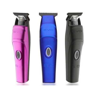 Três máquinas de cortar cabelo EVO em rosa, azul e preta com lâminas protegidas