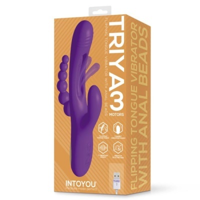 Caixa dourada com vibrador roxo TRIYA 3 com texto e ícones