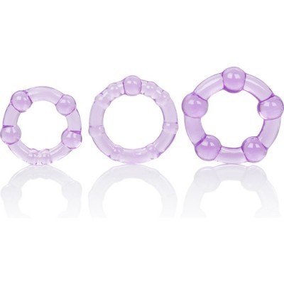 Três anéis de silicone lilás em fundo branco