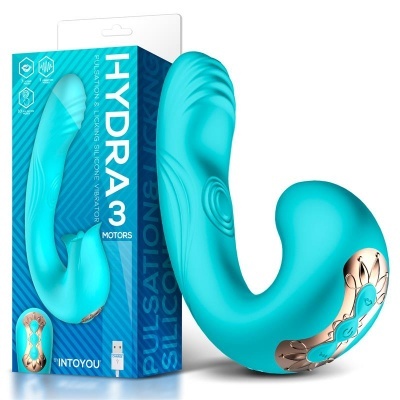 Vibrador azul turquesa com detalhes dourados e embalagem azul
