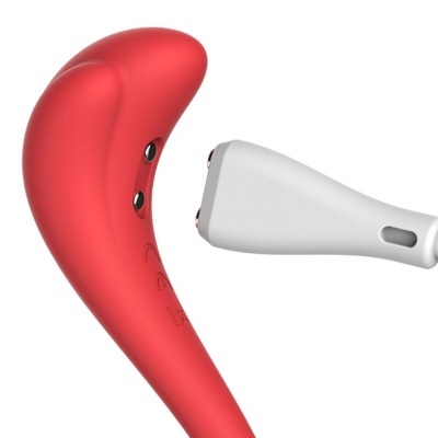 Dispositivo eletrônico em duas partes, vermelho curvado e branco com pontas metálicas