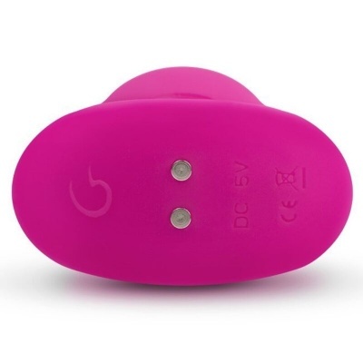 Produto rosa em silicone com pinos metálicos e símbolos impressos