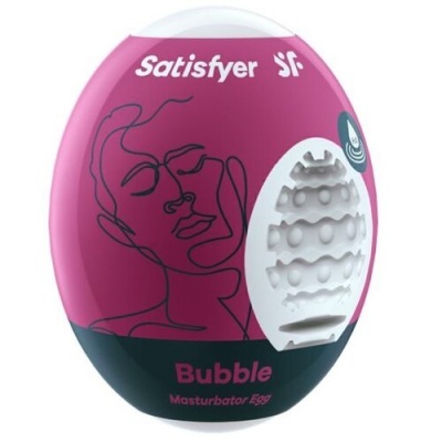 Embalagem Satisfyer Bubble Masturbator Egg rosa e preto com ilustração de rosto e interior texturado branco