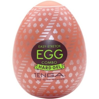 Ovo laranja com padrões brancos e etiqueta preta com texto EGG COMBO HARD GEL
