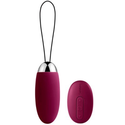 Conjunto de dois objetos vinhos um oval com ponta metálica prateada e alça, outro retangular com botões e texto