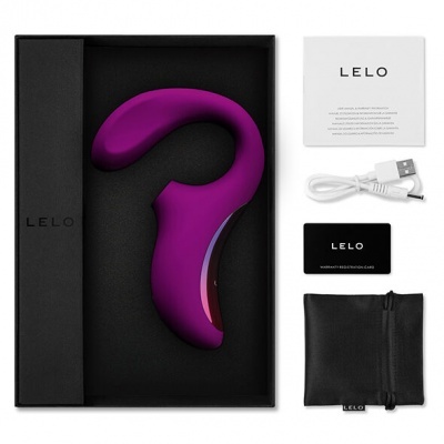 Dispositivo roxo LELO com acessórios em embalagem preta e fundo branco