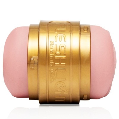 Dispositivo rosa com corpo dourado e texto em relevo 'FLESHLIGHT Made in the USA'