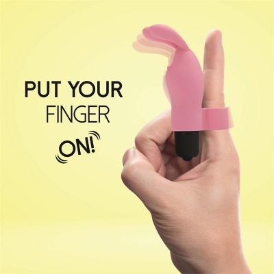 Objeto rosa em forma de coelho num dedo com texto 'PUT YOUR FINGER ON!'