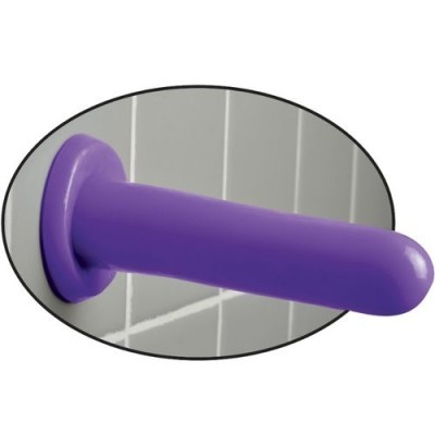 Objeto cilíndrico roxo em parede de azulejos cinzentos