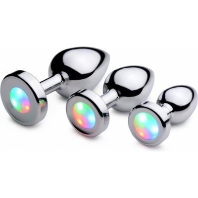 Conjunto de três plugues anal metálicos com luzes LED multicoloridas