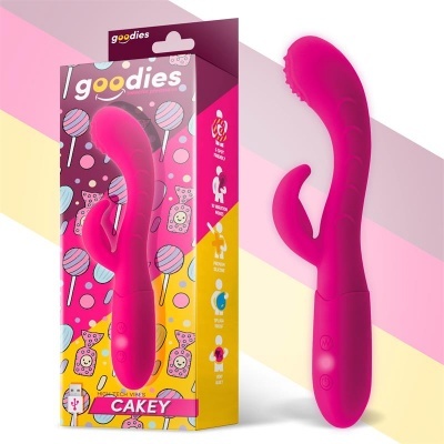 Vibrador rosa em silicone com embalagem colorida de pirulitos.