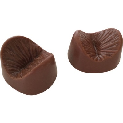 Dois bombons de chocolate com textura na superfície