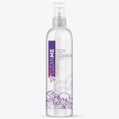 Frasco transparente com spray e rótulo branco e roxo de Toy Cleaner alcool free