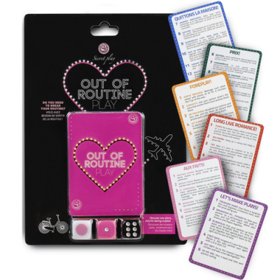 Jogo de cartas e dados OUT OF ROUTINE PLAY com caixa rosa e cartas coloridas em embalagem preta