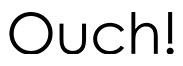 Texto 'Ouch!' em preto sobre fundo branco