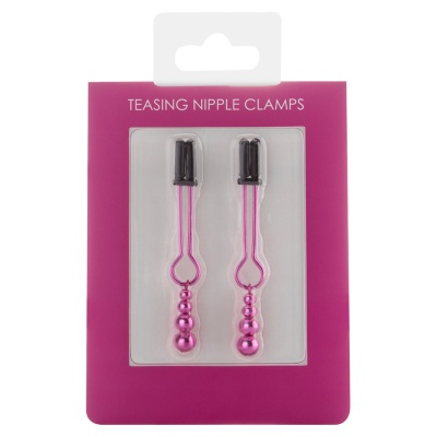 Dois grampos para mamilos rosa metálico em embalagem rosa com texto TEASING NIPPLE CLAMPS