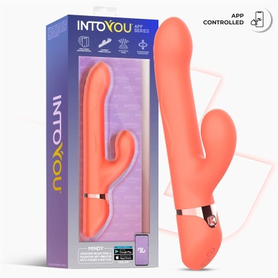 Vibrador cor-de-rosa com caixa roxa e azul ao lado