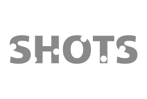 Logotipo da marca SHOTS em cinzento sobre fundo branco