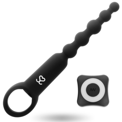 Objeto preto com esferas e controlo remoto preto e branco