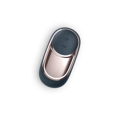 Controlo remoto pequeno oval preto com botões e acabamento metálico rosa