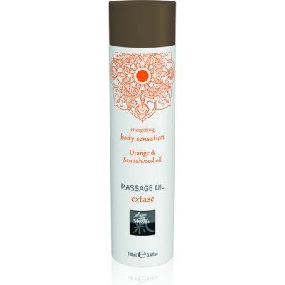 Frasco de óleo de massagem energizante com tampa castanha e rótulo branco com texto laranja e preto.