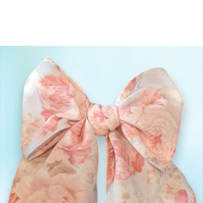 Laço de cabelo grande com padrão floral rosa e bege