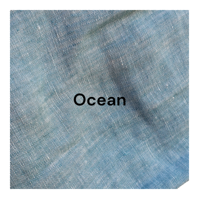 Tecido azul texturizado com palavra Ocean