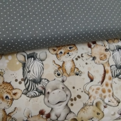 Tecido com padrão de animais e tecido cinza às estrelas.